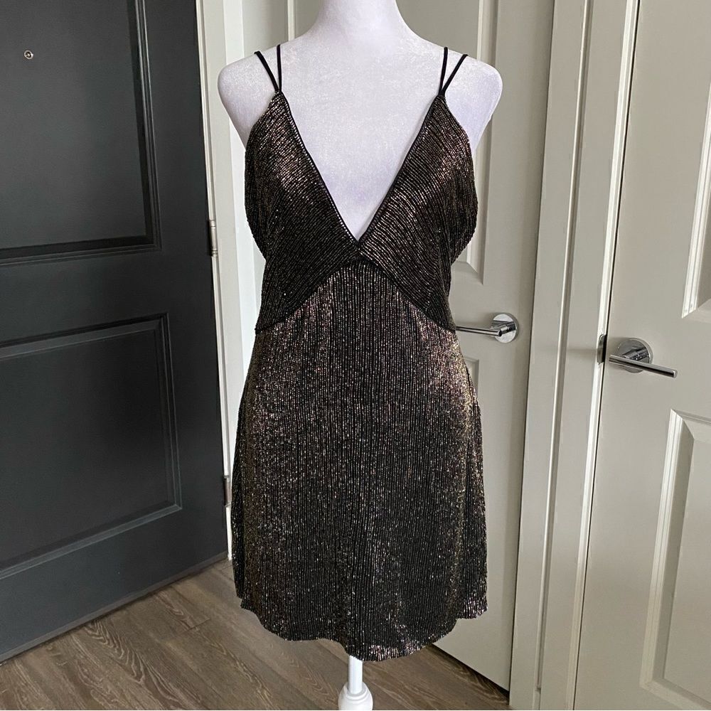 Elegant Black and Gold Mini Dress